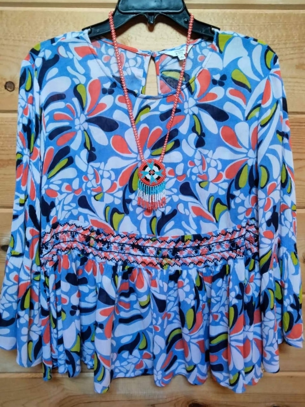 Floral Abstract Long-Sleeve Peplum Top in Blue and Coral